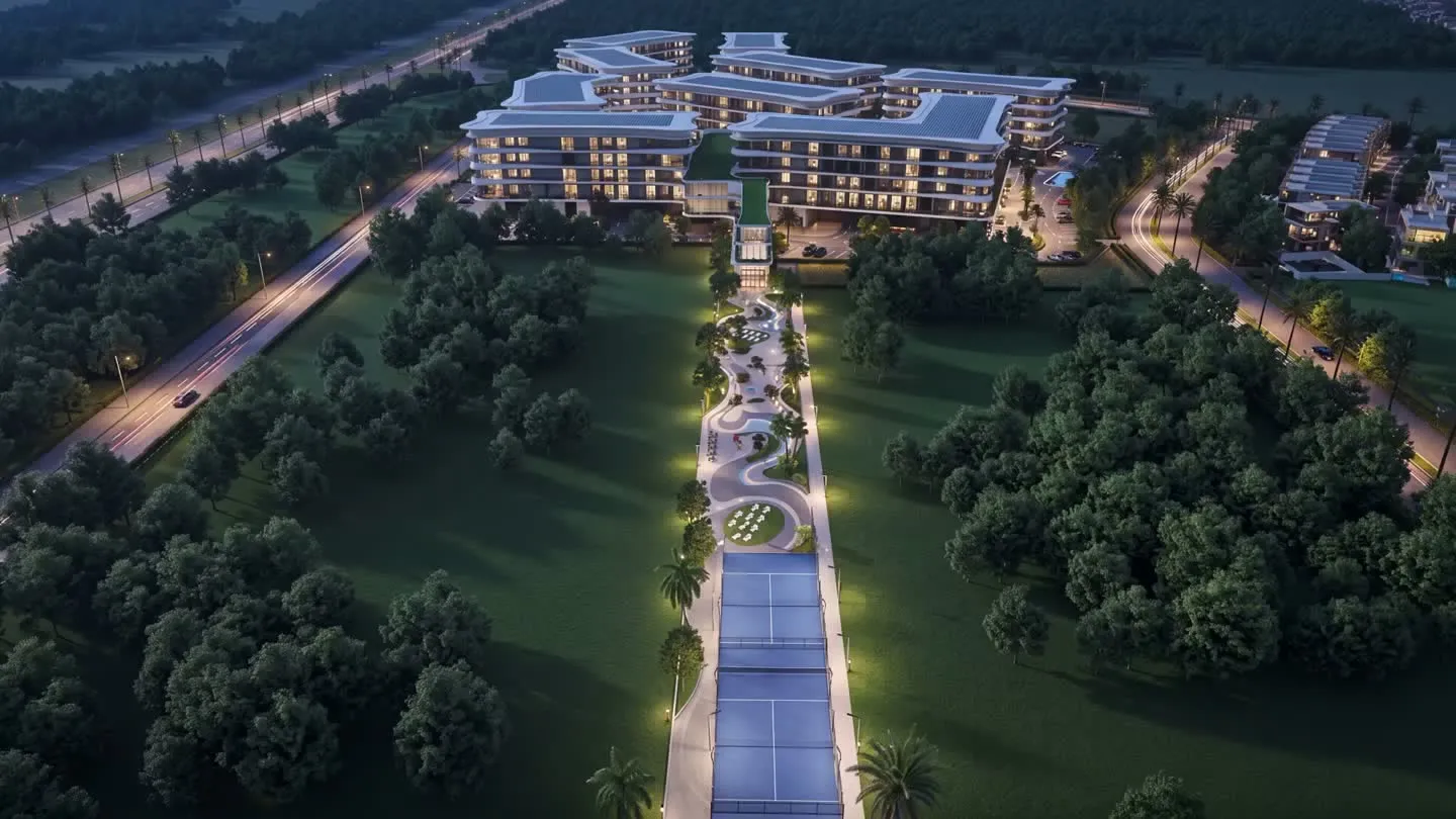 Letecký pohled na projekt Dubai Lifestyle City za soumraku